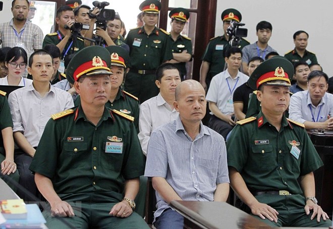 Bị cáo Đinh Ngọc Hệ, nguyên Phó Tổng giám đốc Tổng Công ty Thái Sơn (Bộ Quốc phòng) tại phòng xét xử. (Ảnh: Văn Điệp/TTXVN)