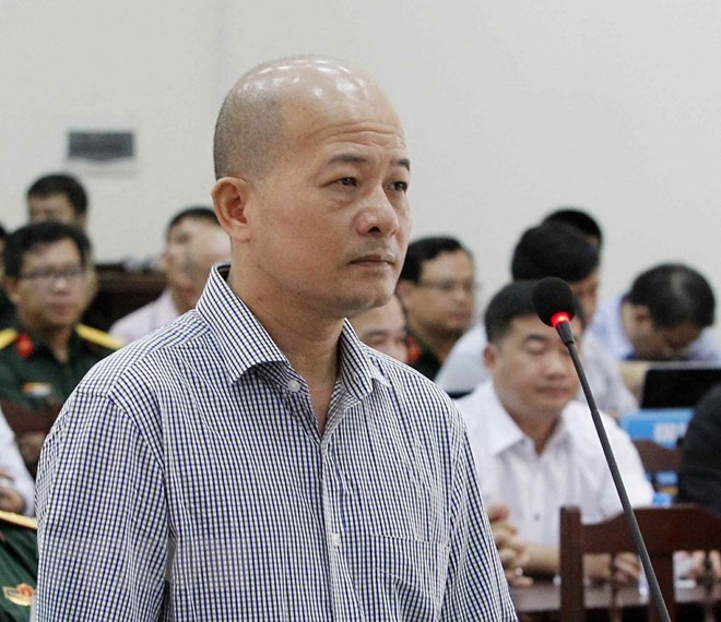 Bị cáo Đinh Ngọc Hệ, nguyên Phó Tổng giám đốc Tổng Công ty Thái Sơn (Bộ Quốc phòng) tại phiên tòa. (Ảnh: Văn Điệp/TTXVN)