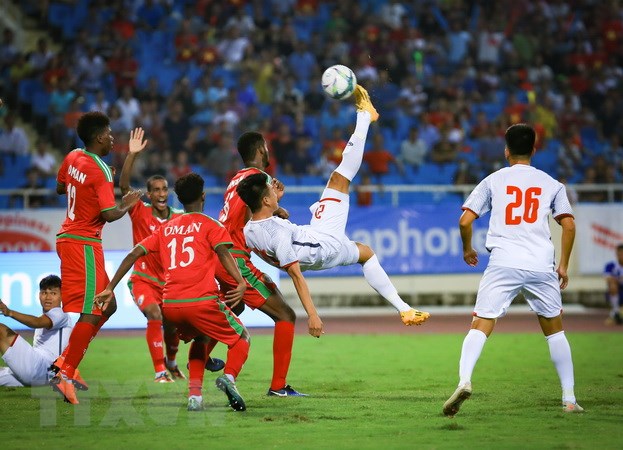 U23 Việt Nam (áp trắng) đánh bại U23 Oman. (Ảnh: Trọng Đạt/TTXVN)