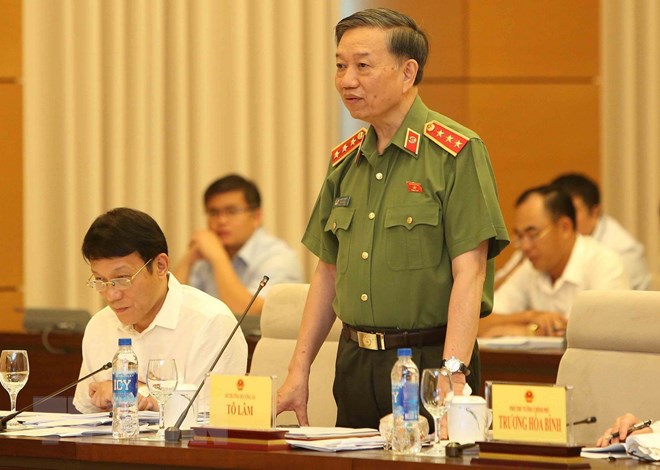 Bộ Trưởng Bộ Công an Tô Lâm trả lời chất vấn của các đại biểu Quốc hội. (Ảnh: Dương Giang/TTXVN)