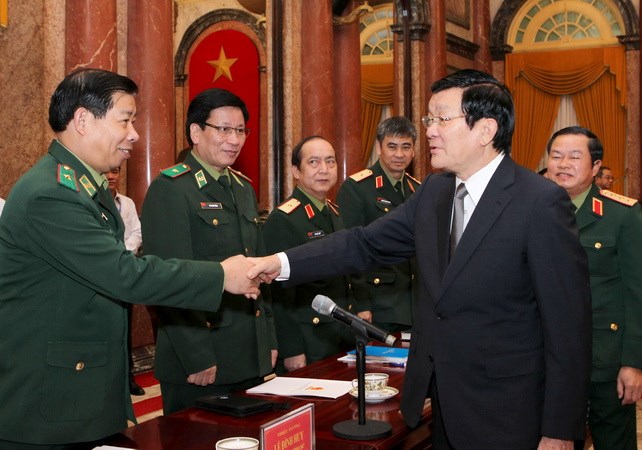 Chủ tịch nước Trương Tấn Sang gặp các đại biểu dự buổi làm việc. (Ảnh: Nguyễn Khang/TTXVN)