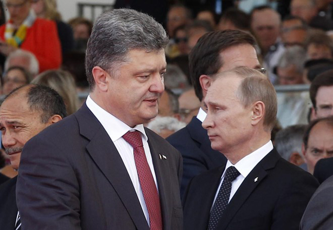 Tổng thống Ukraine Petro Poroshenko và Tổng thống Nga Vladimir Putin tại Normandy hồi tháng 6/2014 (Nguồn: Reuters)