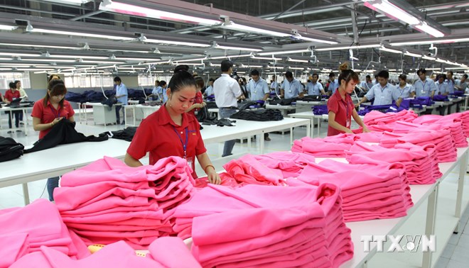 Sản xuất hàng may mặt xuất khẩu tại Công ty TNHH Hansae Việt Nam (100% vốn nước ngoài), Thành phố Hồ Chí Minh (ảnh tư liệu). (Ảnh: Thanh Vũ/TTXVN)