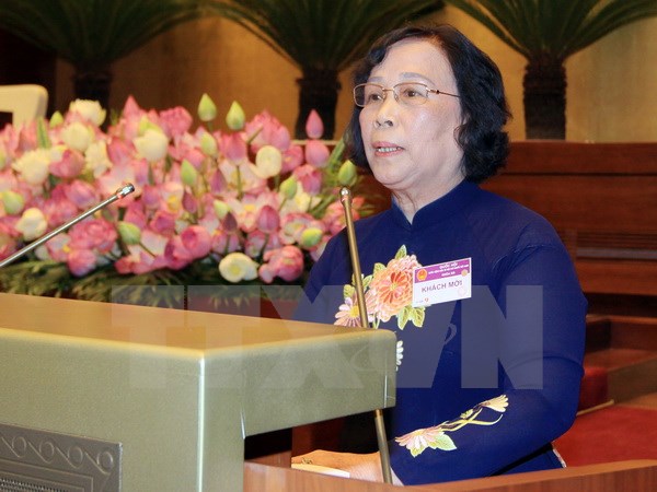 Bộ trưởng Bộ Lao động, Thương binh và Xã hội Phạm Thị Hải Chuyền trình bày Báo cáo về Điều 60 của Luật Bảo hiểm xã hội. (Ảnh: An Đăng/TTXVN)