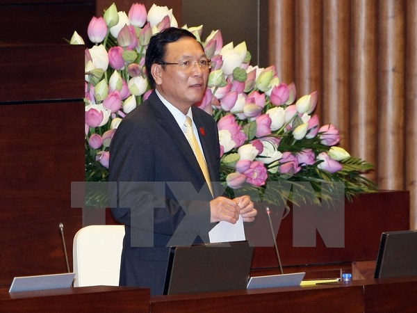 Bộ trưởng Bộ Giáo dục và Đào tạo Phạm Vũ Luận trả lời chất vấn của đại biểu Quốc hội. (Ảnh: Phạm Kiên/TTXVN)