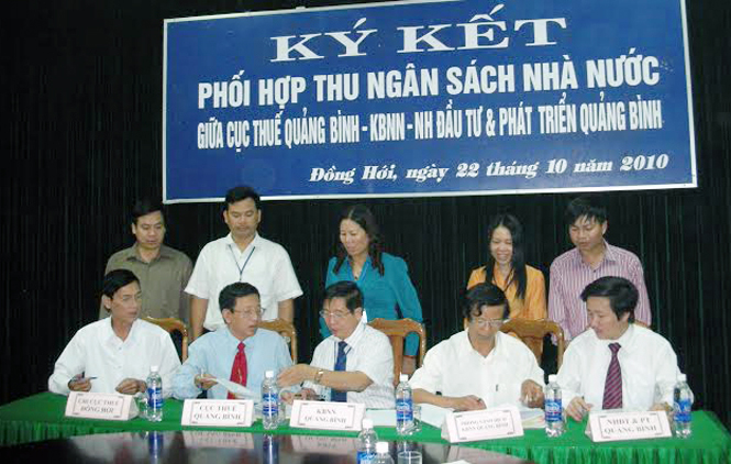 KBNN Quảng Bình ký cam kết phối hợp với các đơn vị thực hiện nhiệm vụ thu NSNN.