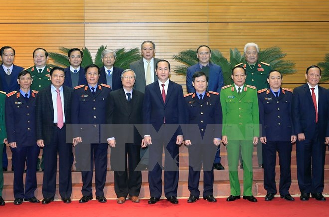 Chủ tịch nước Trần Đại Quang với các đại biểu.( Ảnh: Nhan Sáng/TTXVN)