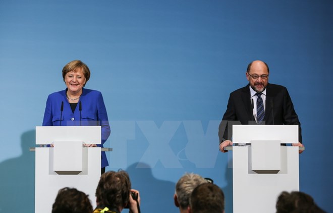 Thủ tướng Đức đồng thời là lãnh đạo Dân chủ/Xã hội Cơ đốc giáo (CDU/CSU) Angela Merkel và Lãnh đạo SPD Martin Schulz trong cuộc họp báo tại Berlin ngày 12-1. (Nguồn: THX/TTXVN)