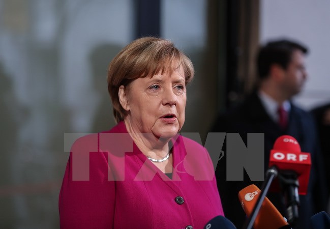 Thủ tướng Đức Angela Merkel trả lời báo giới trước cuộc đàm phán thành lập Chính phủ liên minh tại Berlin ngày 7/1. (Nguồn: THX/TTXVN)