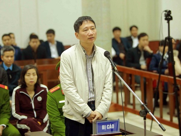 Bị cáo Trịnh Xuân Thanh trả lời Hội đồng xét xử về kiểm tra căn cước. (Ảnh: An Đăng/TTXVN)