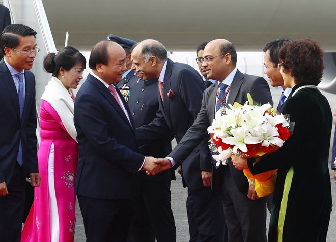 Lễ đón Thủ tướng Nguyễn Xuân Phúc và Phu nhân tại sân bay quân sự Palam, New Delhi trưa 24-1. (Ảnh: Thống Nhất/TTXVN)