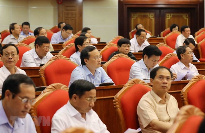  Hội nghị lần thứ bảy Ban Chấp hành Trung ương Đảng Cộng sản Việt Nam thảo luận Đề án cải cách chính sách tiền lương. (Nguồn: TTXVN)