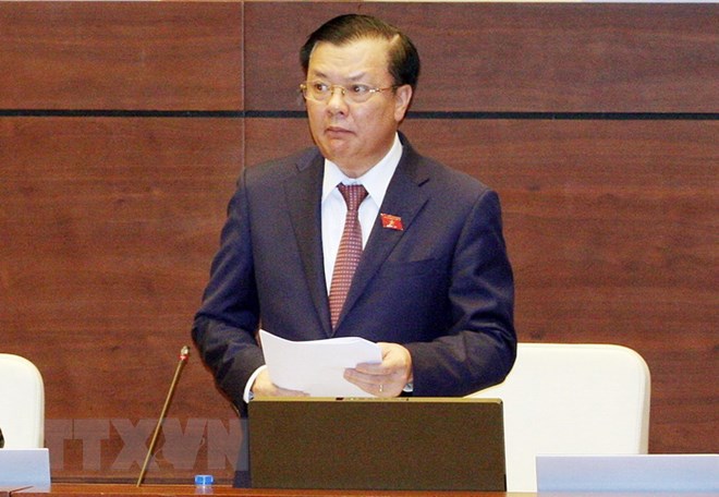 Bộ trưởng Bộ Tài chính Đinh Tiến Dũng phát biểu. (Ảnh: Nguyễn Dân/TTXVN)