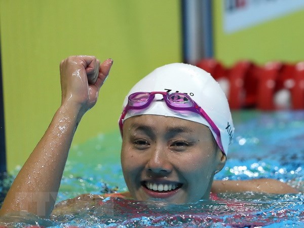 Niềm vui của vận động viên Liu Xiang sau khi phá kỷ lục thế giới ở nội dung 50 mét bơi ngửa của nữ tại ASIAD 2018 ở Jakarta, Indonesia ngày 21-8. (Ảnh: THX/TTXVN)
