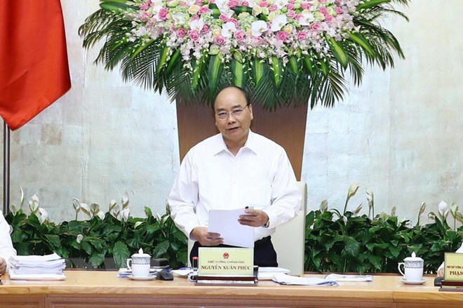 Thủ tướng Nguyễn Xuân Phúc phát biểu tại phiên họp Chính phủ. (Ảnh: Thống Nhất/TTXVN)
