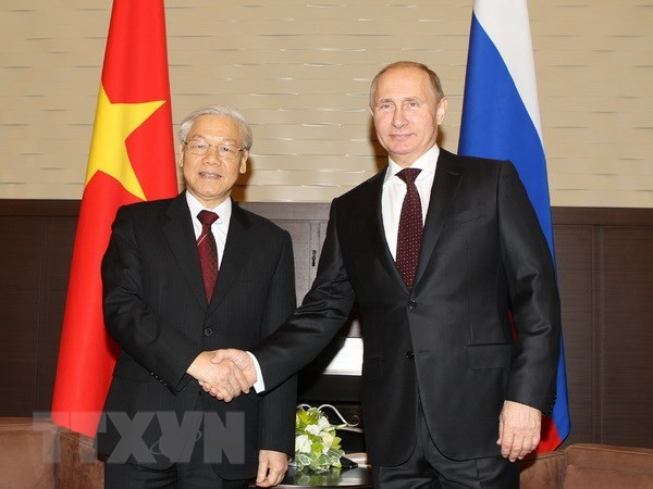 Tổng thống Liên bang Nga Vladimir Putin đón Tổng Bí thư Nguyễn Phú Trọng trong chuyến thăm năm 2014. (Ảnh: Trí Dũng/TTXVN)