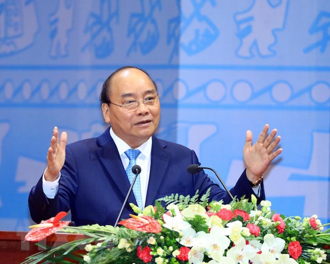 Thủ tướng Nguyễn Xuân Phúc giải đáp những thắc mắc của đại biểu. (Ảnh: TTXVN)