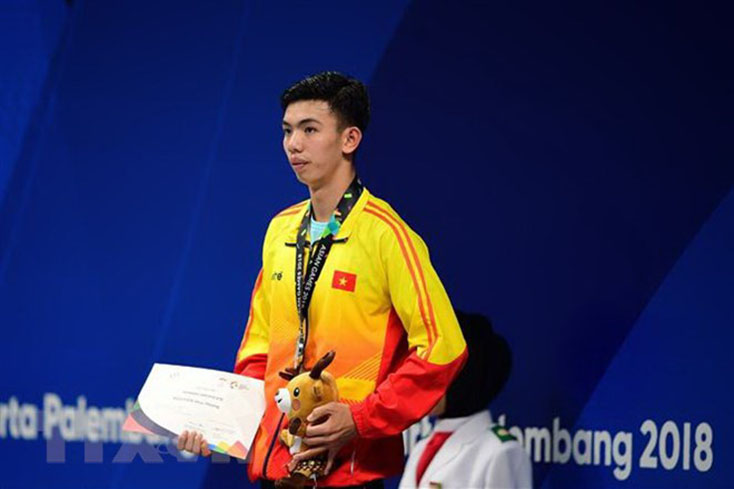 Vận động viên Nguyễn Huy Hoàng đoạt huy chương bạc nội dung bơi tự do 1.500m nam tại ASIAD 2018 diễn ra ở Jakarta, Indonesia ngày 24/8. (Ảnh: AFP/TTXVN)