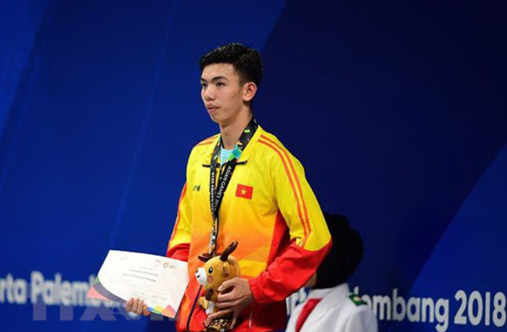 Vận động viên Nguyễn Huy Hoàng đoạt huy chương bạc nội dung bơi tự do 1.500m nam tại ASIAD 2018 diễn ra ở Jakarta, Indonesia ngày 24-8. (Ảnh: AFP/TTXVN)