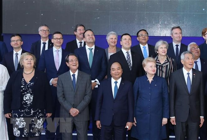 Thủ tướng Nguyễn Xuân Phúc và các Trưởng đoàn dự Phiên họp toàn thể thứ hai của ASEM 12, sáng 19-10-2018, tại Brussels (Bỉ). (Ảnh: Thống Nhất/TTXVN)
