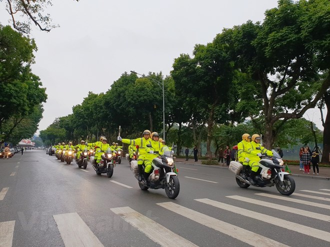 Cảnh sát giao thông ra quân đảm bảo trật tự an toàn giao thông năm 2019. (Ảnh: Việt Hùng/Vietnam+)