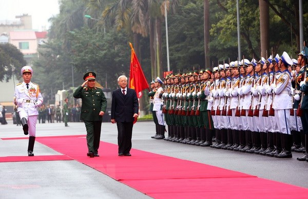 Tổng Bí thư, Chủ tịch nước Nguyễn Phú Trọng, Bí Thư Quân ủy Trung ương duyệt đội danh dự. (Ảnh: Dương Giang/TTXVN)