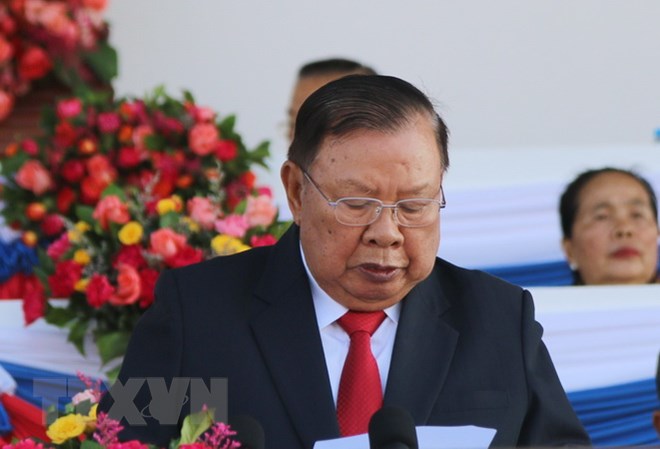 Tổng Bí thư, Chủ tịch nước Lào Bounnhang Vorachith đọc Diễn văn khai mạc tại buổi lễ. (Ảnh: Xuân Tú/TTXVN)