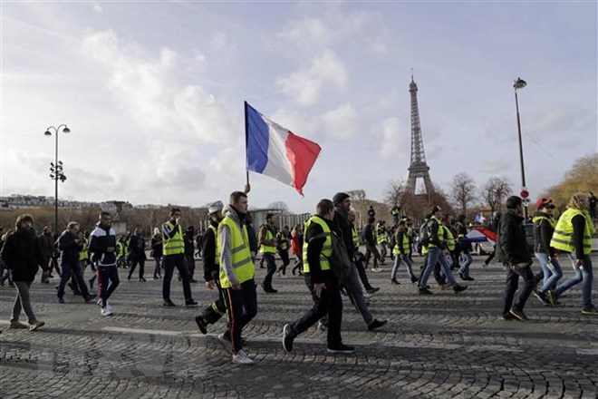 Người biểu tình Áo vàng tập trung tại thủ đô Paris, Pháp, ngày 9-2-2019. (Nguồn: AFP/TTXVN)
