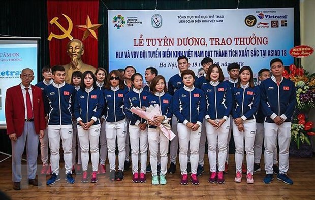 Lễ tuyên dương, trao thưởng cho các huấn luyện viên, vận động viên đội tuyển điền kinh quốc gia đạt thành tích xuất sắc tại Đại hội Thể thao châu Á lần thứ 18 (ASIAD năm 2018). (Ảnh: Trọng Đạt/TTXVN)