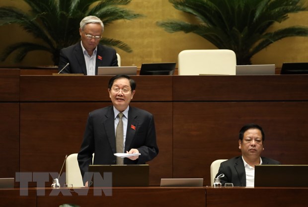 Bộ trưởng Bộ Nội vụ Lê Vĩnh Tân phát biểu làm rõ một số vấn đề đại biểu Quốc hội nêu. (Ảnh: Văn Điệp/TTXVN)