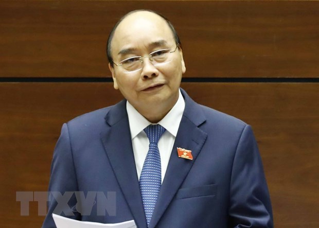 Thủ tướng Nguyễn Xuân Phúc trả lời chất vấn của đại biểu Quốc hội. (Ảnh: Thống Nhất/TTXVN)