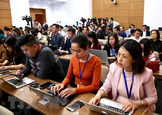 Phóng viên các cơ quan báo chí trong nước và quốc tế tham dự họp báo. (Ảnh: Dương Giang/TTXVN)