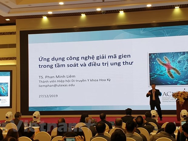 Tiến sỹ Phan Minh Liêm trình bày tại hội nghị. (Ảnh: PV/Vietnam+)