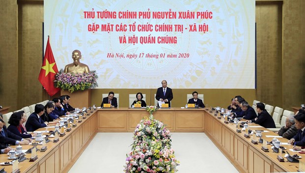 Thủ tướng Nguyễn Xuân Phúc gặp mặt thân mật Đoàn đại biểu các tổ chức chính trị -xã hội và hội quần chúng. (Ảnh: Thống Nhất/TTXVN)