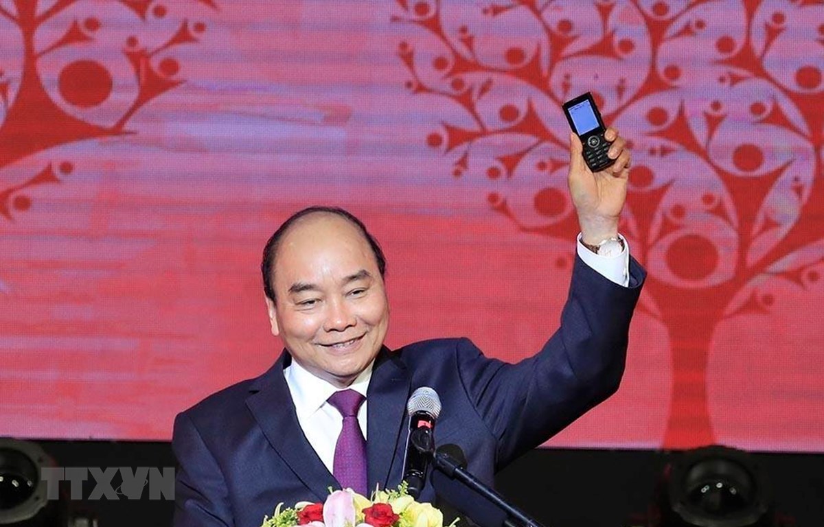 Thủ tướng Nguyễn Xuân Phúc nhắn tin ủng hộ Tết vì người nghèo và nạn nhân chất độc da cam. (Ảnh: Thống Nhất/TTXVN)