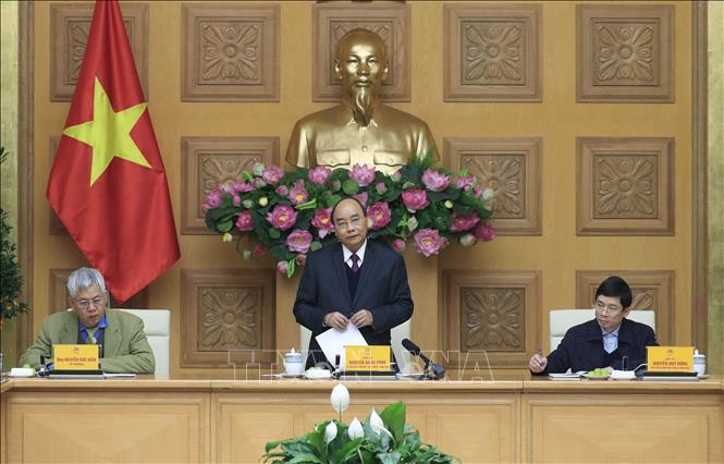 Thủ tướng Nguyễn Xuân Phúc làm việc với Tổ tư vấn kinh tế của Thủ tướng. Ảnh: Thống Nhất/TTXVN