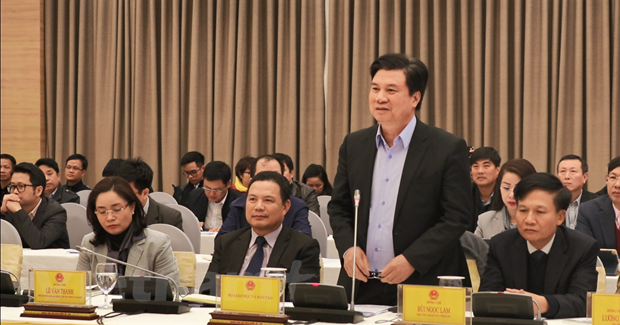 Thứ trưởng Nguyễn Hữu Độ phát biểu tại phiên họp báo Chính phủ tối 5-2. (Ảnh: Hoàng Hiếu/Vietnam+)