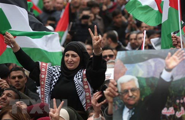 Người dân Palestine tuần hành phản đối kế hoạch hòa bình Trung Đông của Mỹ, tại thành phố Ramallah, Bờ Tây ngày 11-2-2020. (Ảnh: THX/TTXVN)
