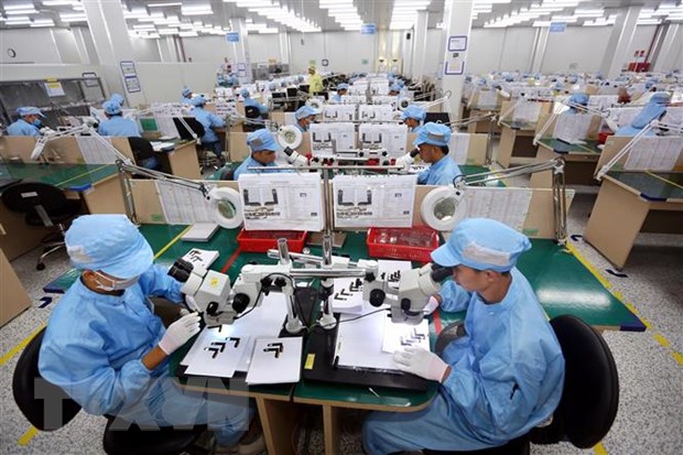 Việt Nam đang đẩy mạnh công nghiệp hóa, hiện đại hóa và hội nhập quốc tế. (Ảnh: Danh Lam/TTXVN)