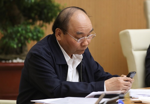 Thủ tướng Nguyễn Xuân Phúc nhắn tin ủng hộ phòng chống dịch COVID-19 - Ảnh: VGP/Quang Hiếu