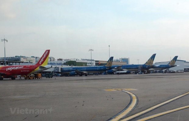  Máy bay của các hãng hàng không Vietnam Airlines và Vietjet. (Ảnh: Việt Hùng/Vietnam+)