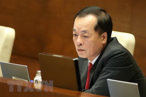  Bộ trưởng Bộ Xây dựng Phạm Hồng Hà tại phiên họp chiều 23-5. (Ảnh: Dương Giang/TTXVN)