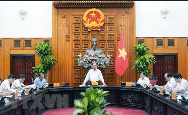 Thủ tướng Nguyễn Xuân Phúc chủ trì phiên họp Thường trực Chính phủ về cơ chế phát triển nguồn và lưới điện. (Ảnh: Thống Nhất/TTXVN)