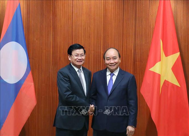 Thủ tướng Nguyễn Xuân Phúc hội đàm Thủ tướng Lào Thongloun Sisoulith. Ảnh: Thống Nhất/TTXVN