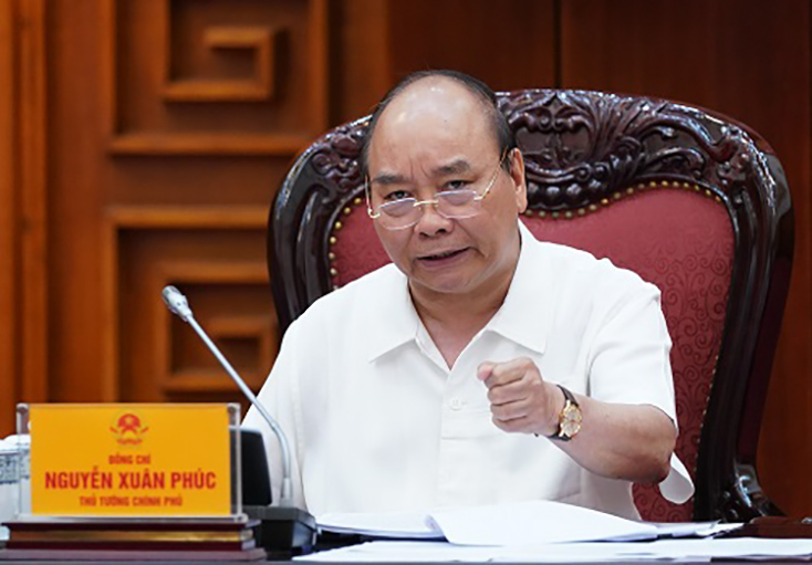  Thủ tướng Nguyễn Xuân Phúc phát biểu tại cuộc họp - Ảnh: VGP/Quang Hiếu