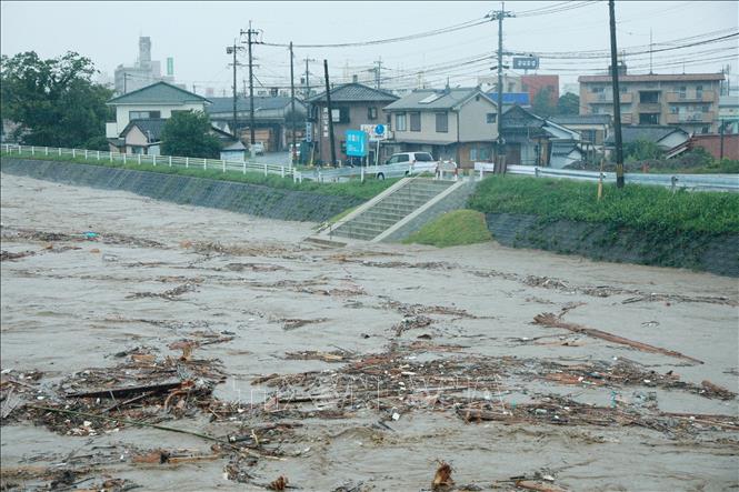 Nước sông dâng cao do mưa lũ tại tỉnh Kumamoto, Nhật Bản ngày 4-7-2020. Ảnh minh họa: AFP/TTXVN