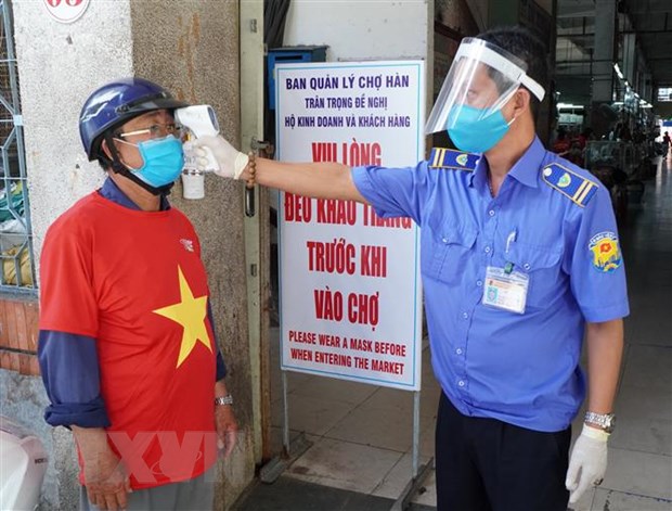  Các chợ lớn tại thành phố Đà Nẵng đang thực hiện nghiêm túc các quy định về phòng, chống dịch COVID-19. (Ảnh: Quốc Dũng/TTXVN)
