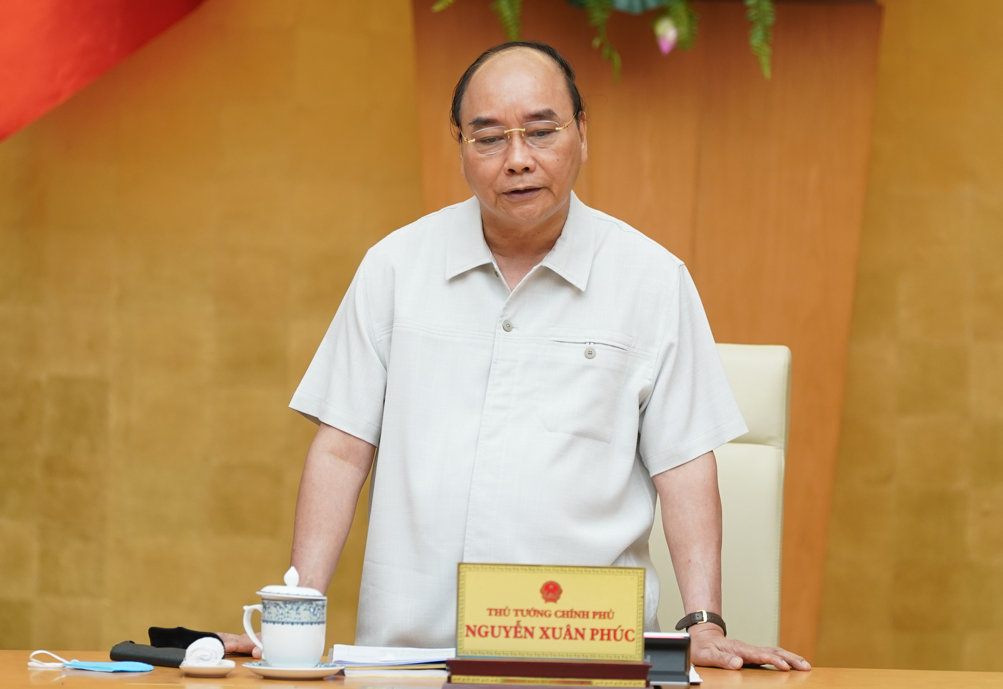  Thủ tướng Nguyễn Xuân Phúc phát biểu kết luận cuộc họp. Ảnh: VGP/Quang Hiếu  