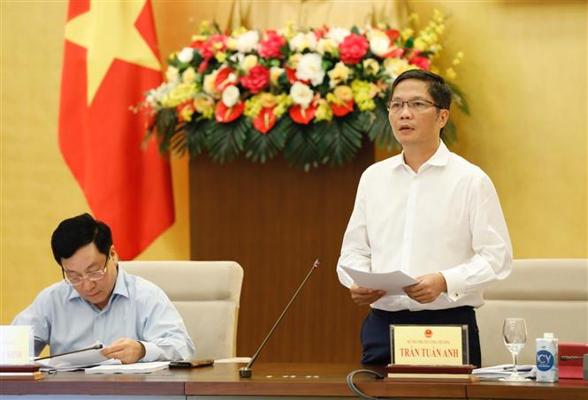 Bộ trưởng Bộ Công Thương Trần Tuấn Anh phát biểu tại buổi làm việc. Ảnh: Dương Giang/TTXVN.