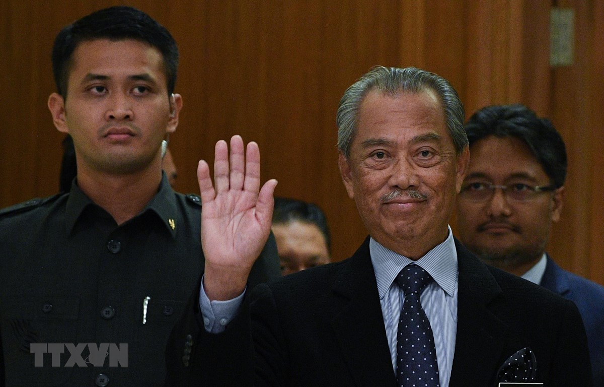  Thủ tướng Malaysia Muhyiddin Yassin (phải) tại một sự kiện ở Putrajaya ngày 9-3-2020. (Ảnh: AFP/ TTXVN)